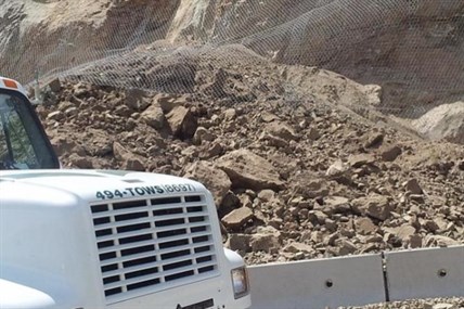 The pile of rock that slide down a rock face along Highway 97 just north of Summerland on Sunday, July 6, 2014.