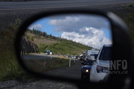 View of to the east along Highway 97C following a traffic accident near Merritt on Friday, July 25, 2014.