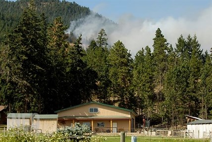 A fire in Peachland is burning near homes, August 7, 2014.