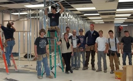 Volunteers help build the Brock Activity Centre in the Brock Shopping Mall.