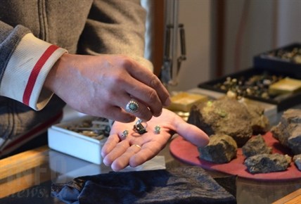 Donna Nelson's find has already been converted into unique pieces of jewelry. The Opal Miners Gift Shop crafts visitor's opals into one of a kind jewelry on site. 