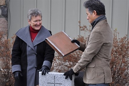Chairman of St. Paul's board Judy McAulay and Reverend Doctor Richard Chung with the time capsule found under St. Paul's United Church.
