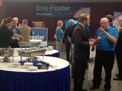 A crowd starts to build at the Liberal campaign party for Eric Foster.