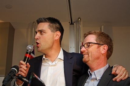 Liberal candidates Todd Stone and Terry Lake of the Kamloops South and North Thompson ridings let out a cheer as they celebrate with a crowded room at Hotel 540 Tuesday night.