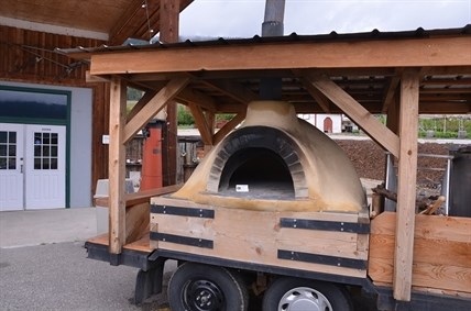 A wood burning oven is used to bake breads and pizzas with vegetables grown in the gardens. Selling fresh dishes at the cafe is just one of ways Gatzke uses retail to boost the income generated by his farm.