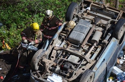 Rescue crews had to saw open the overturned vehicle in order to remove the deceased driver. 