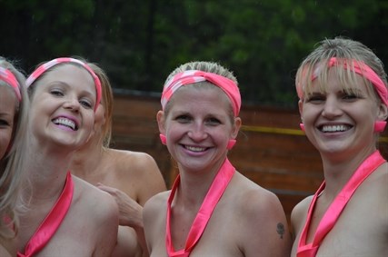 Patti Hillman and her friends braved the cold rainy weather today to zipline naked and raise money for breast cancer research