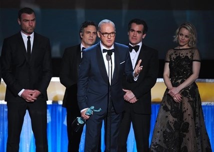 Michael Keaton, foreground, accepts the award for outstanding cast in a motion picture for “Spotlight” as fellow cast members, background from left, Liev Schreiber, Mark Ruffalo, Brian d'Arcy James, and Rachel McAdams look on, at the 22nd annual Screen Actors Guild Awards at the Shrine Auditorium & Expo Hall on Saturday, Jan. 30, 2016, in Los Angeles.