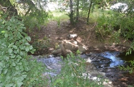 Mill Creek in Kelowna where a body was found Sunday night.