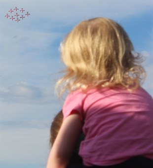 This child has the best seat to watch Canada's Snowbirds perform their trademark aerial acrobatics.