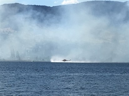 Helicopters bucketing from the nearby lake. 
