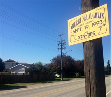 A sign asking for tips remains where Sherri McLaughlin's bicycle was found 20 years ago.