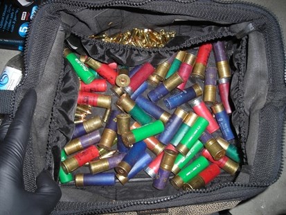 Andrew Robert Hardenstine was also carrying dozens of shotgun shells and 9 mm rounds at the time of his Wednesday night arrest.