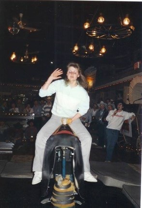 Monique Vek riding the mechanical bull in the 90s.