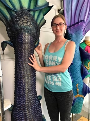 Eccleston is pictured with one of her handmade mermaid tails.