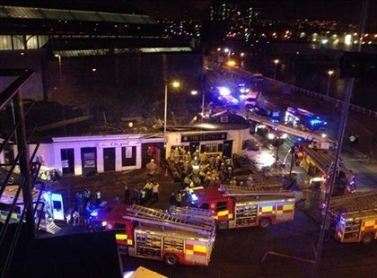 Picture taken with permission from Jan Hollands Twitter feed JanHollands@Janney_h of the helicopter crash at the Clutha Bar in Glasgow Friday Nov. 29, 2013. 