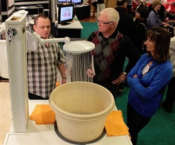 The ThunderHead shower was a bit of a hit at the Canadian Home Builders' Association South Okanagan 18th annual Home and Renovation Show on Saturday. Company rep James Eaton shows off the unit to prospective buyers Al Rycroft and Betty Rycroft of Penticton.