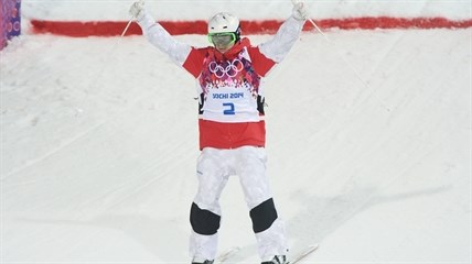 Mikael Kingsbury of Canada skis during the second finals run in the men's moguls freestyle skiing event at the Sochi Winter Olympics in Krasnaya Polyana, Russia, Monday, Feb. 10, 2014.