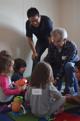 Education manager Kevin Ned joins elders and children at the language nest. 