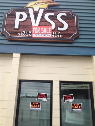 Armstrong grads covered their school with For Sale signs this week in a well planned prank. 