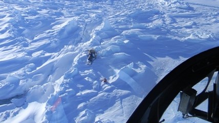 A photograph taken from a search and rescue helicopter shows the snowmobile abandoned by a young boy who died in Labrador in February 2012. 