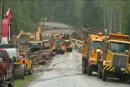 Road repairs continue on Sunday, May 4, 2014 on the washed out section of Mabel Lake Road.