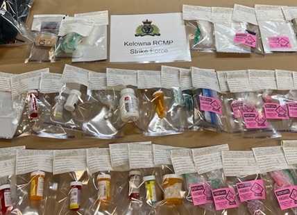 Cash and pills seized in Kelowna drug bust