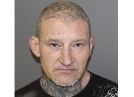 Vernon RCMP searching for wanted man with skull and neck tattoos