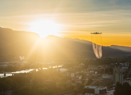 iN PHOTOS: Sun rises behind plane spraying for invasive moth in Kamloops