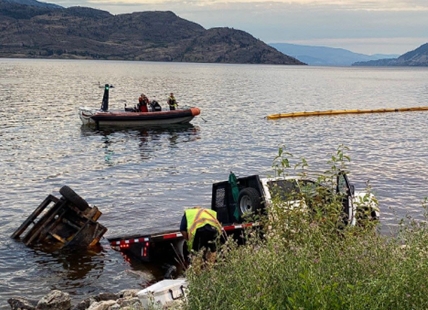 Crews manage spill after road repair truck falls into lake near Peachland