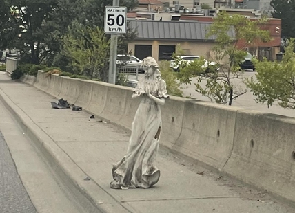 Mysterious statue of woman appears on Vernon sidewalk