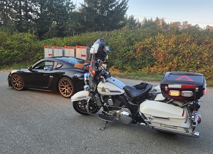 Porsche impounded after winning race with motorcycles on Island Highway
