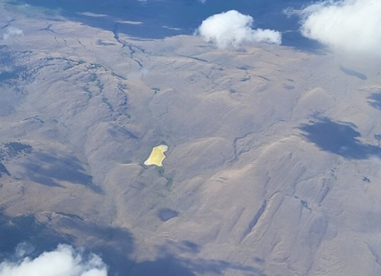 Why a lake seen on flight to Kelowna is an unusual bright yellow