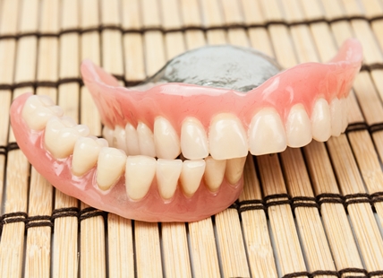 B.C. man who lost dentures during fight with neighbour wins in small claims court