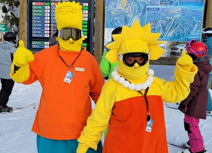 Bart and Lisa Simpson shredding the slopes, handing out chocolate at SilverStar Mountain Resort