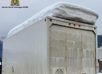 North Okanagan cops bust truck driver with two feet of snow on roof