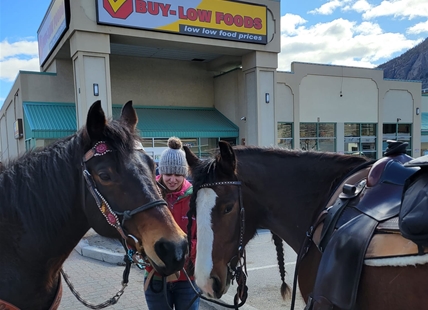 Mounted duo at Keremeos grocery store not saving money with equine transport