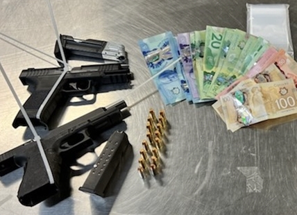 Kelowna cops seize weapons, drugs, cash during arrest of erratic driver