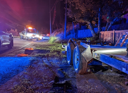 SUV collides with trailer in West Kelowna, flips, lands on its wheels