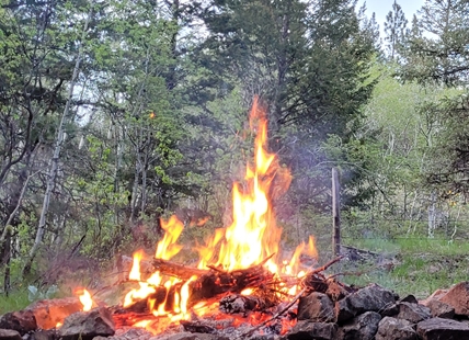 Campfire sparks grass fire in Kelowna