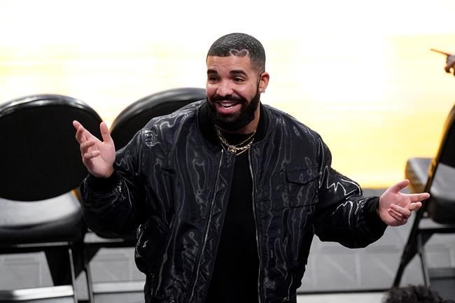 Rapper Drake gestures after watching an NBA basketball Western Conference Play-In game between the Los Angeles Lakers and the Golden State Warriors Wednesday, May 19, 2021, in Los Angeles. THE CANADIAN PRESS/AP/Mark J. Terrill