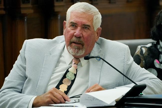 State Senator Kevin Blackwell, R-Southaven, left, asks a question during a hearing of the Mississippi Senate Public Health and Welfare Committee on medical marijuana, Monday, June 28, 2021, at the Capitol in Jackson, Miss. (AP Photo/Rogelio V. Solis)