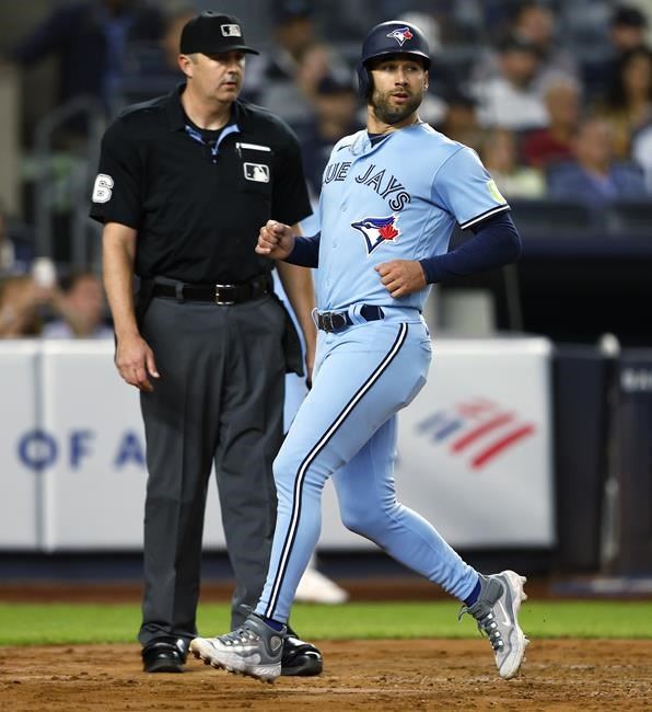 Blue Jays' Kevin Gausman scratched from start because of left side