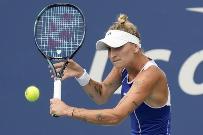 Marketa Vondrousova, of the Czech Republic, returns a shot to Na Lae Han, of South Korea, during the first round of the U.S. Open tennis championships, Tuesday, Aug. 29, 2023, in New York.
