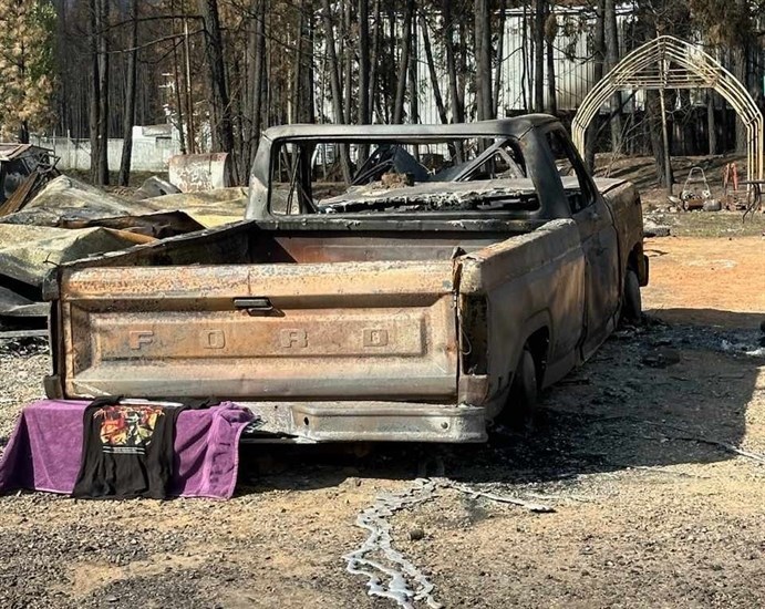 An pet owner's shirt in an area burned by the Bush Creek East wildfire set up to attract the pet. 