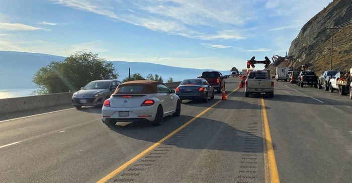 Cars in line for single-lane alternating traffic while the rockslide clean up was happening.