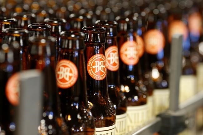 FILE - Empty bottles head down the line to be washed in the factory of Breckenridge Brewery in Littleton, Colo., on Thursday, Jan. 21, 2016. The cannabis company Tilray expanded its position in the craft brew industry with the acquisition of eight beer and beverage brands from Anheuser-Busch, including Breckenridge Brewery. Tilray said that the transaction, which was announced in August 2023, will triple its beer sales volume from four million cases to 12 million. 