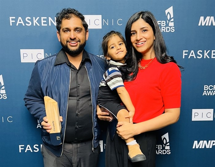 Avi Gill (left), Binny Boparai with their child pose for a photo at the BC Food and Beverage Awards.