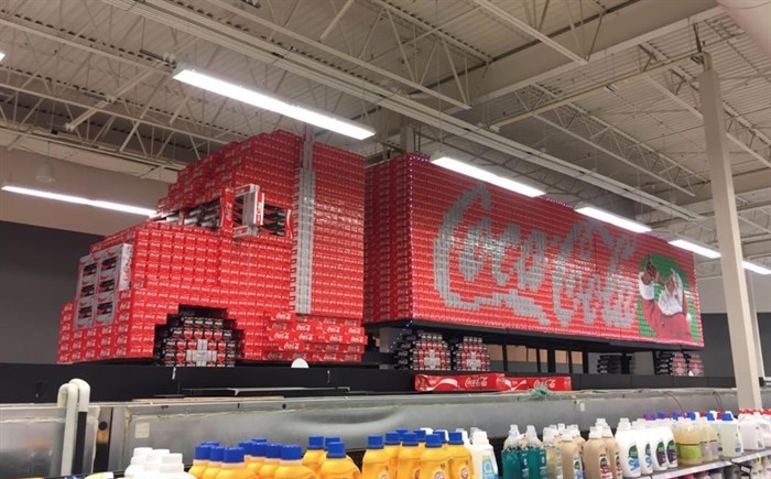 Falkenberg's largest piece was a 50 foot long and 13-foot-tall Coca-Cola themed semi-truck that took over 5,000 boxes to create. 
