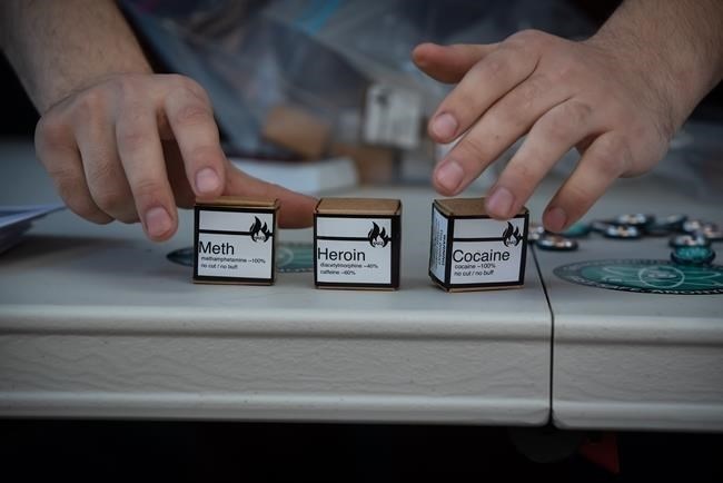 Methamphetamine, heroin and cocaine being handed out by the Drug User Liberation Front are displayed in Vancouver on Wednesday, April 14, 2021.